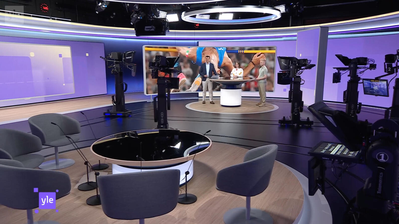 Completed Yle news studio with branded curved LED display